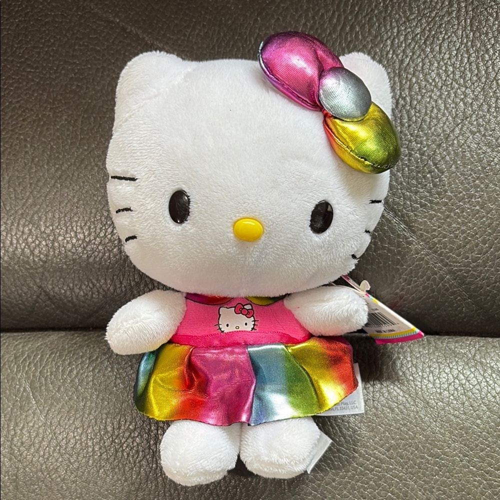 Hello kitty in rainbow metallic dress and bow